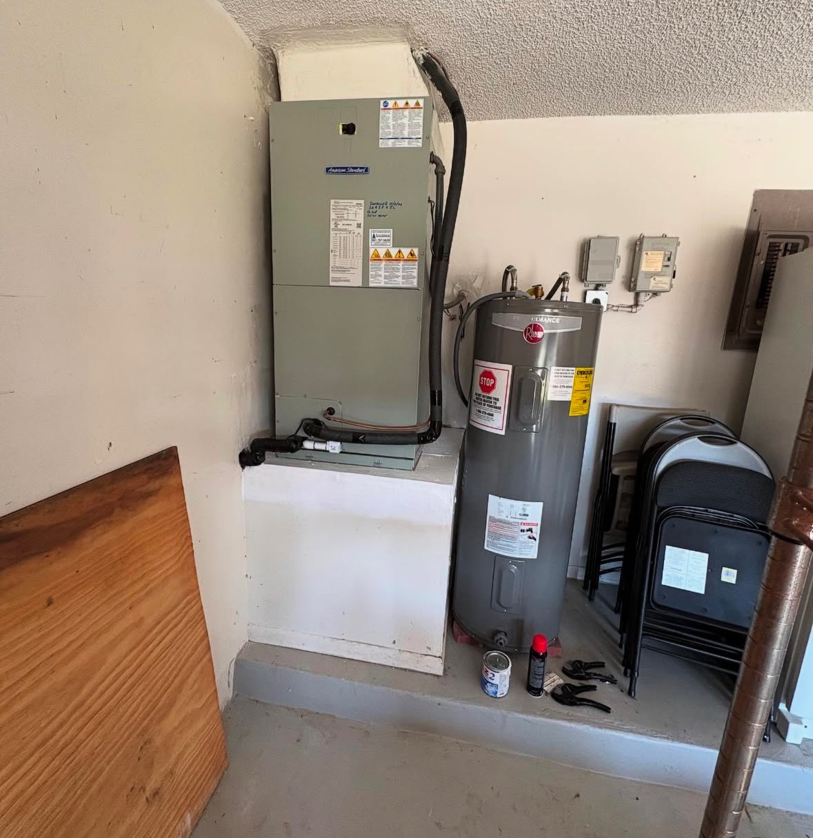 Technician repairing indoor AC unit